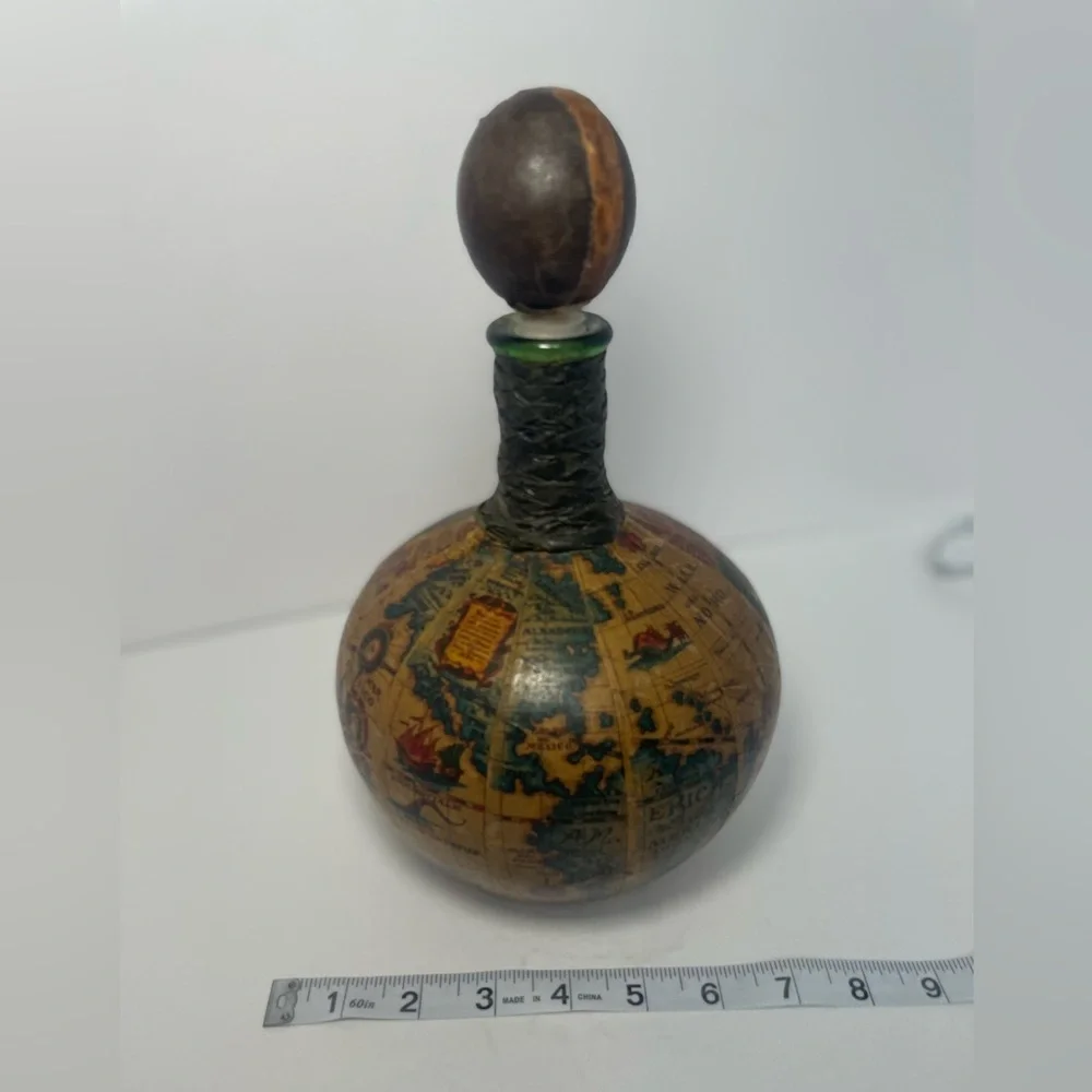 Vintage leather covered globe decanter. Made in Italy.